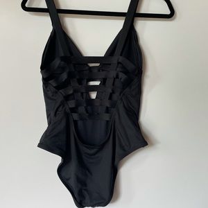 One piece black vitamin A size small